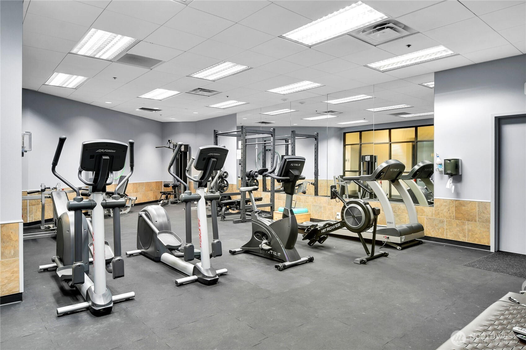5001 California Avenue Southwest, Unit 212 Seattle, WA 98136 - Photo 4 of 18 a view of a room with gym equipment