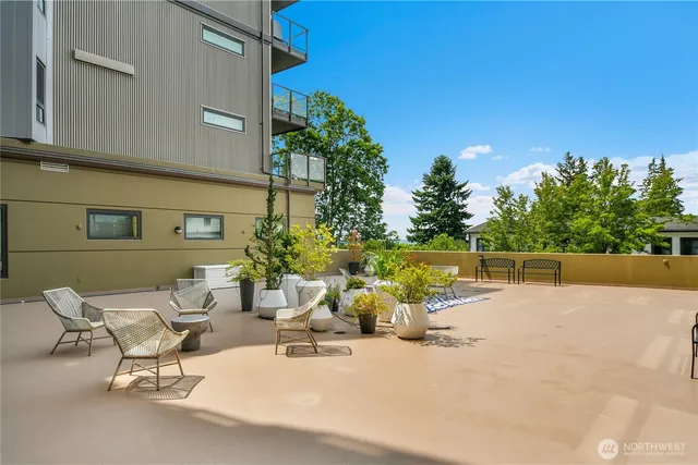 a view of a terrace with seating area