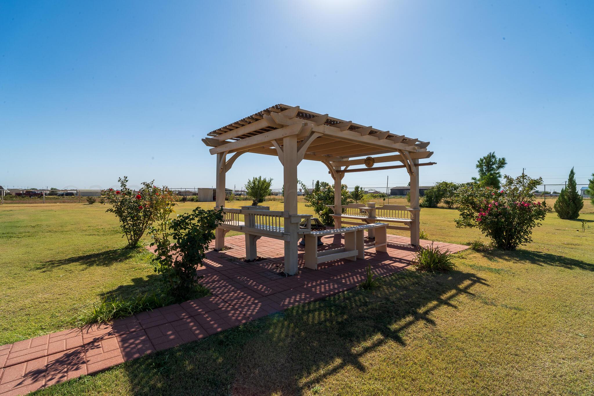 5601 Tranquility Road Amarillo, TX 79118 - Photo 17 of 20 Pergola & land
