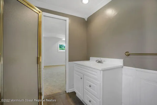 a utility room with cabinets washer and dryer