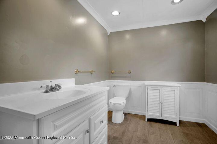 5 Arlene Drive West Long Branch, NJ 07764 - Photo 13 of 17 a bathroom with a sink a toilet and vanity