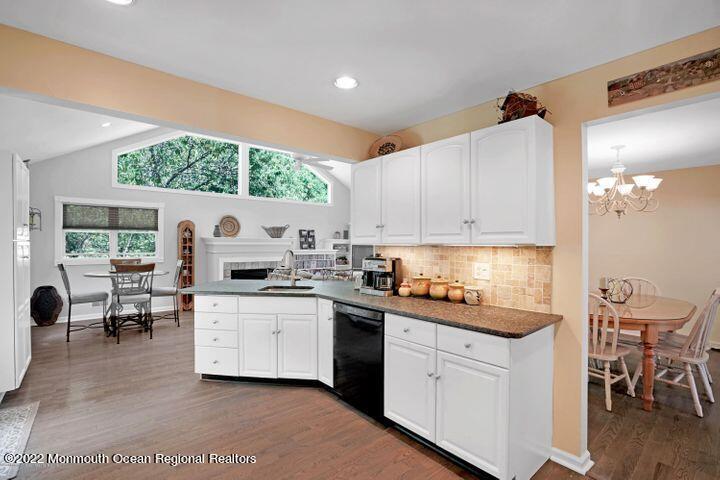 5 Arlene Drive West Long Branch, NJ 07764 - Photo 4 of 17 a kitchen with a sink window and cabinets