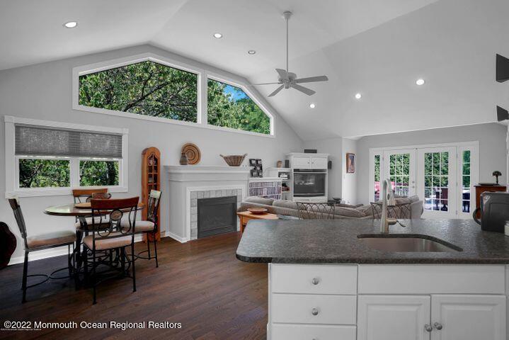 5 Arlene Drive West Long Branch, NJ 07764 - Photo 5 of 17 an open kitchen with furniture and a fireplace