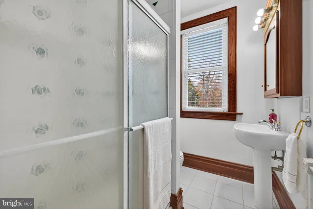 a bathroom with a bathtub and a sink