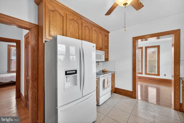 a kitchen with a sink and a window