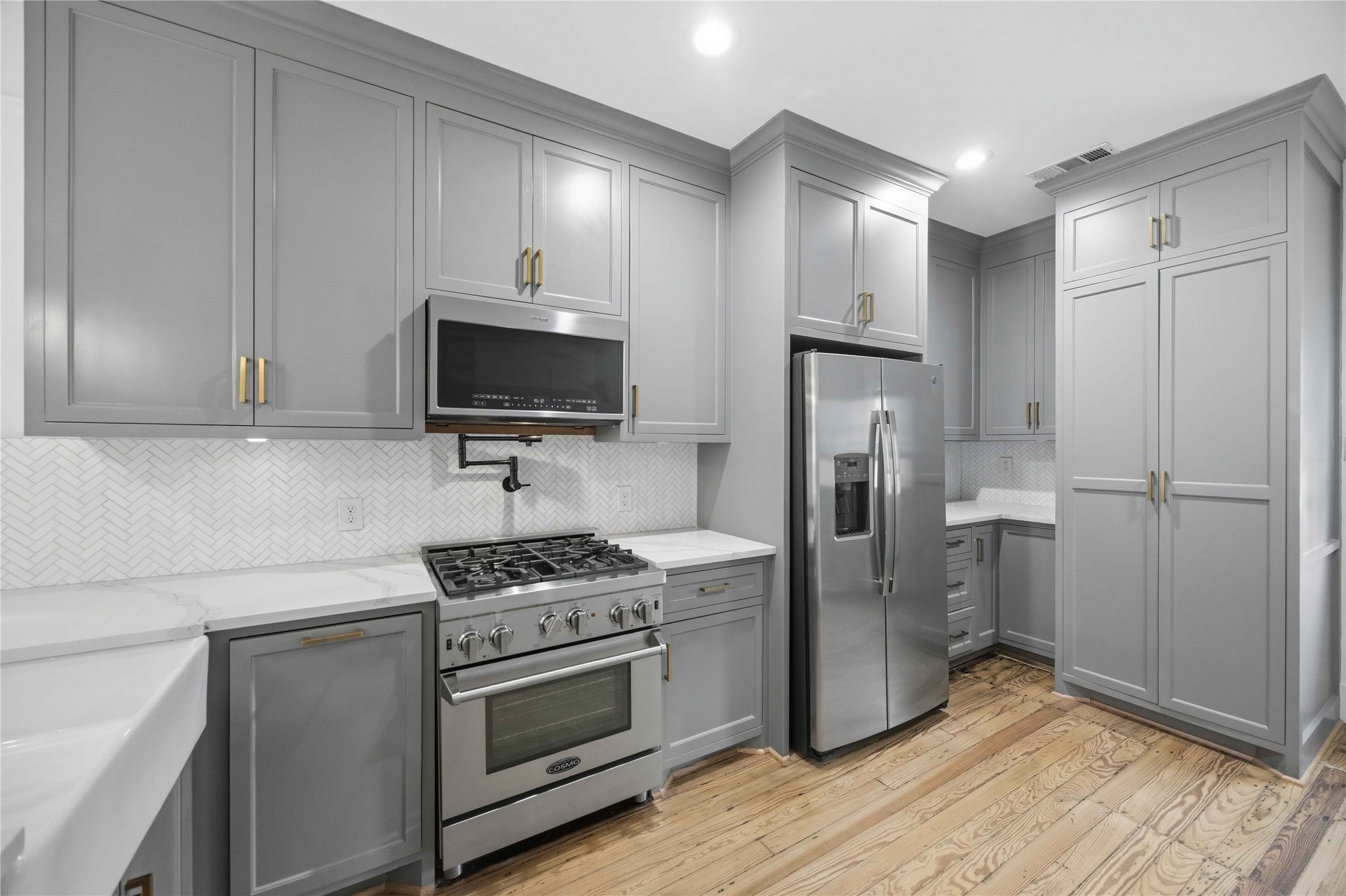 208 Archer Street Houston, TX 77009 - Photo 12 of 26 Look at all the storage you have in the kitchen.