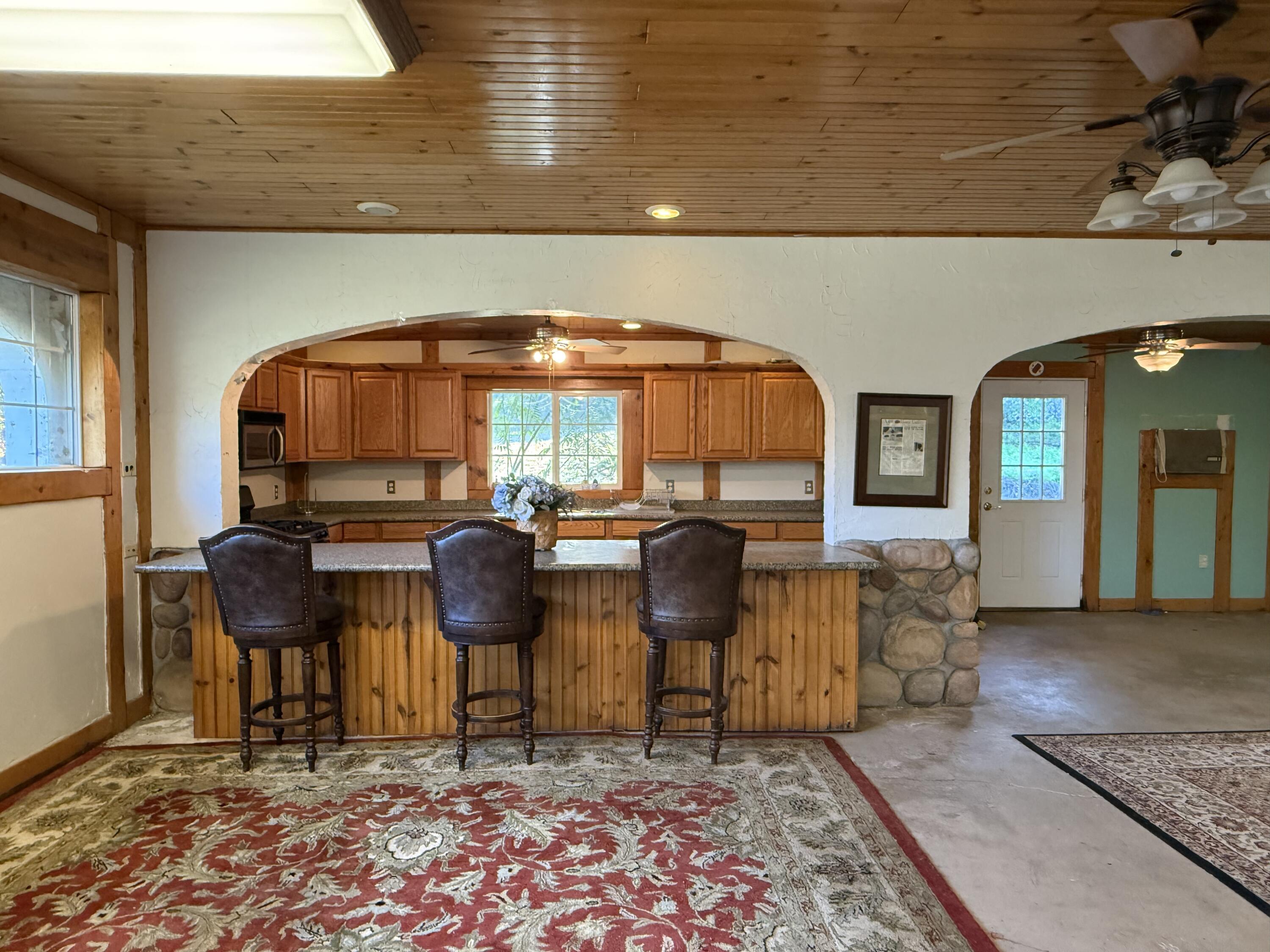 42751 North Fork Drive Three Rivers, CA 93271 - Photo 11 of 13 a living room with furniture and a rug