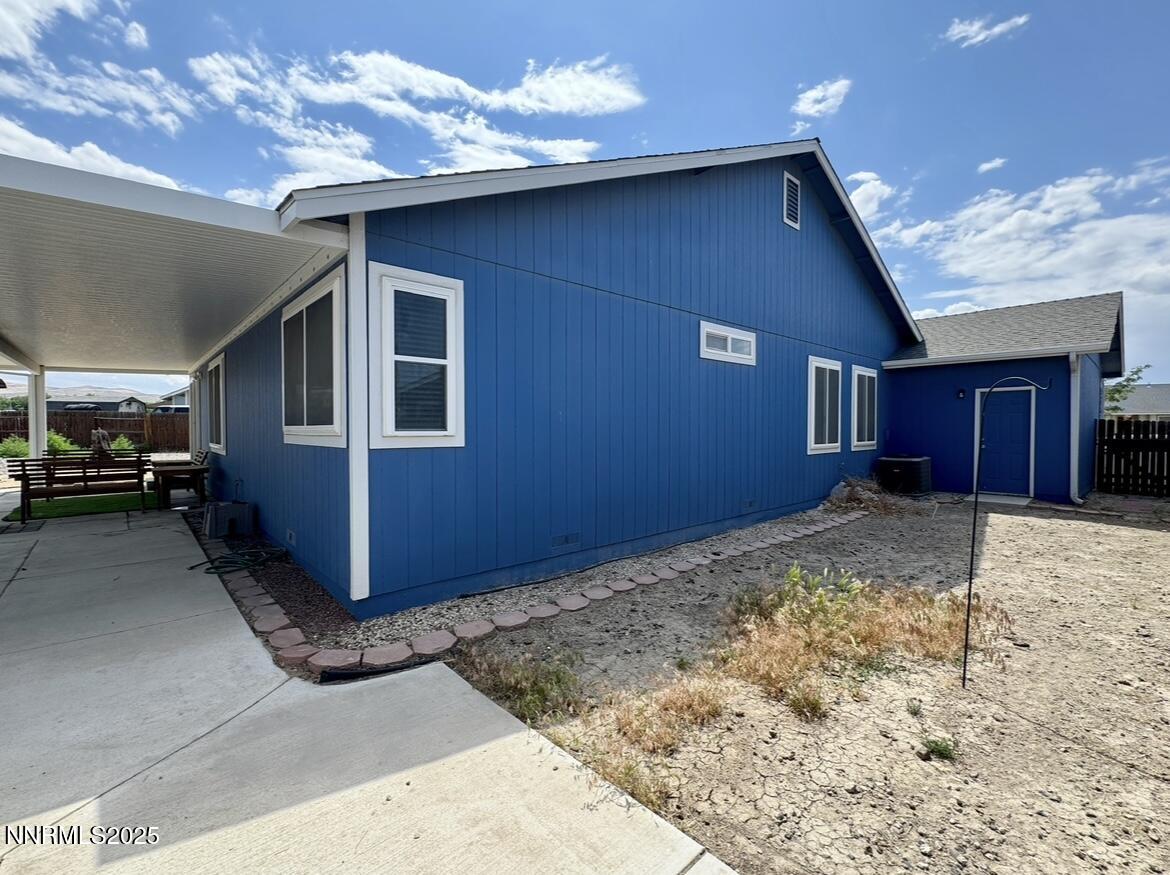 602 Tamsen Road Fernley, NV 89408 - Photo 3 of 18 a view of a house with a snow in the yard