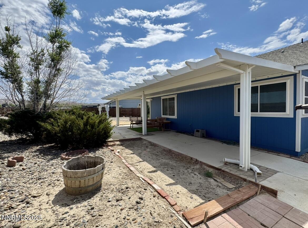 602 Tamsen Road Fernley, NV 89408 - Photo 4 of 18 a view of a patio with couches and potted plants