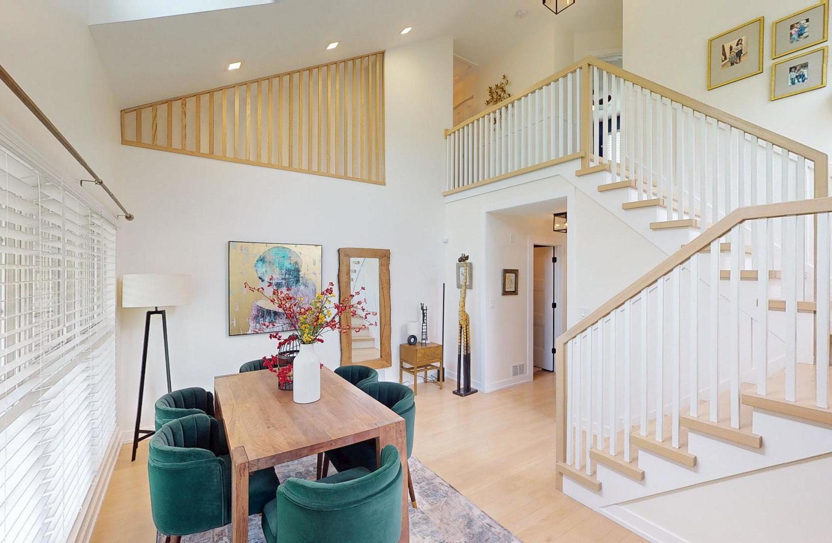 2207 Periwinkle Lane Naperville, IL 60540 - Photo 2 of 40 a living room with furniture and stairs