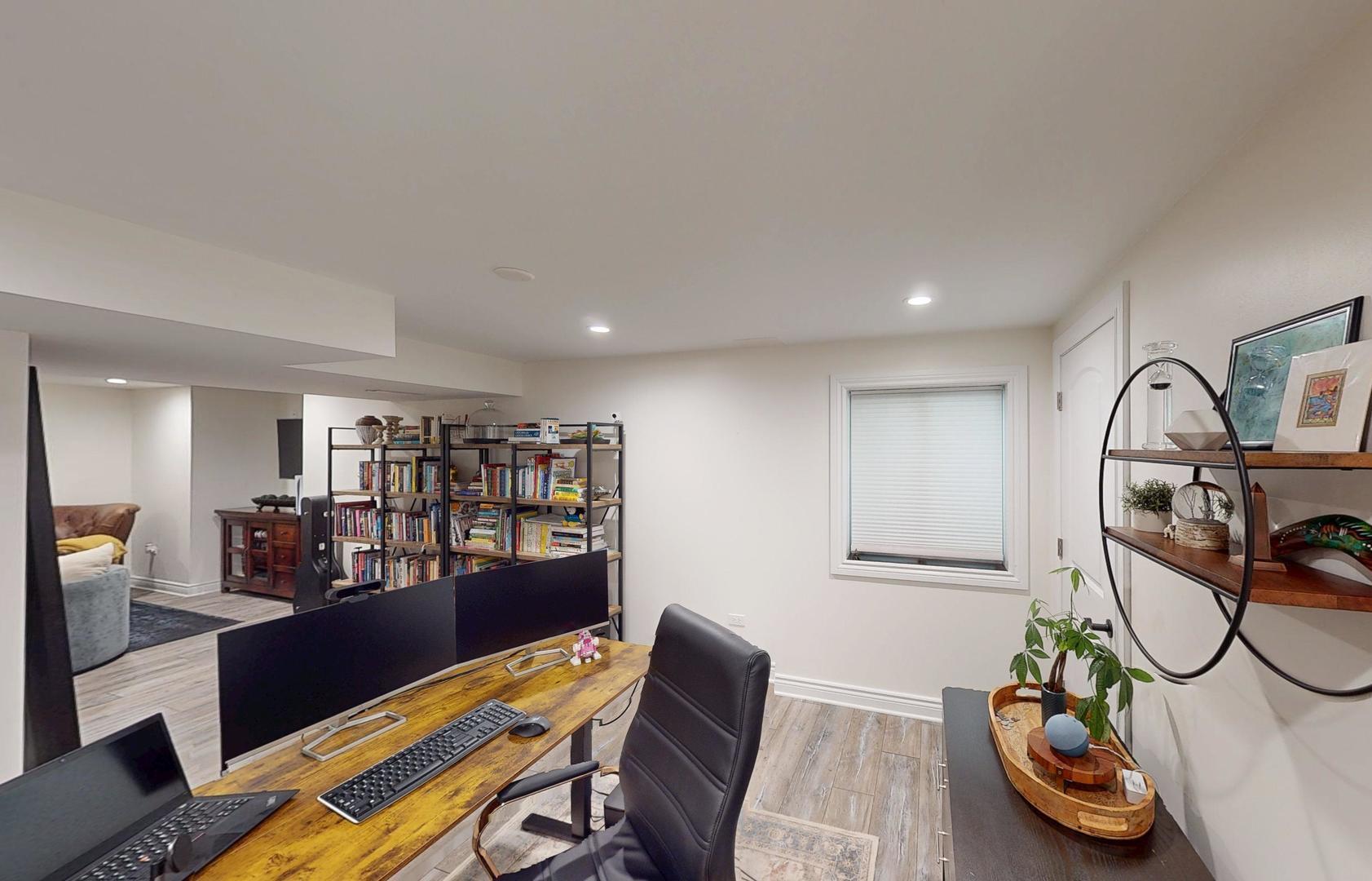 2207 Periwinkle Lane Naperville, IL 60540 - Photo 26 of 40 a view of a room with gym equipment