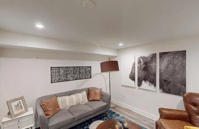 a living room with furniture and a window