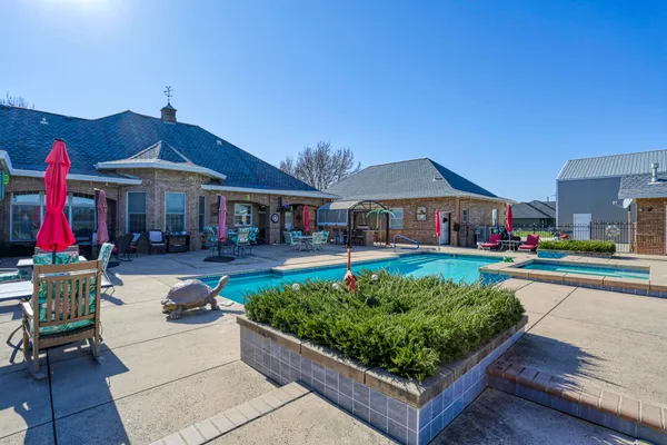 a room with lots of residential buildings and swimming pool