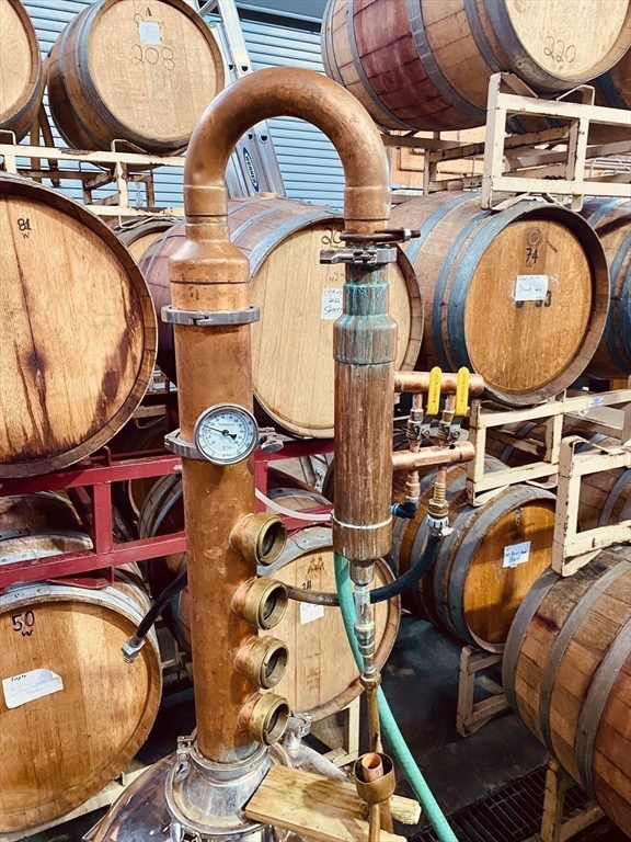 335 Old Fall River Road Dartmouth, MA 02747 - Photo 18 of 32 an aerial view of a swimming pool having outdoor seating