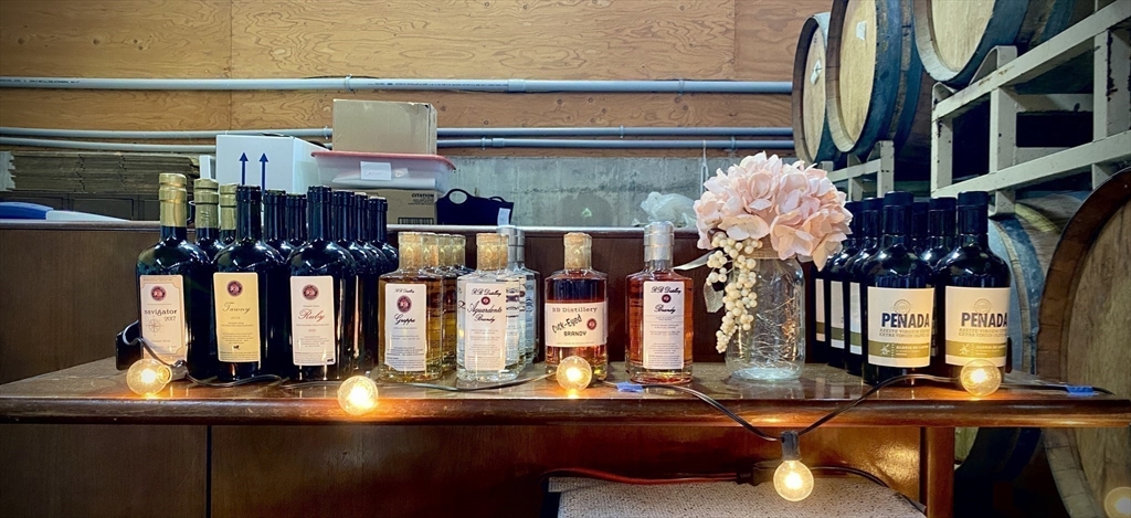 335 Old Fall River Road Dartmouth, MA 02747 - Photo 20 of 32 a room with lots of bottles of alcohol