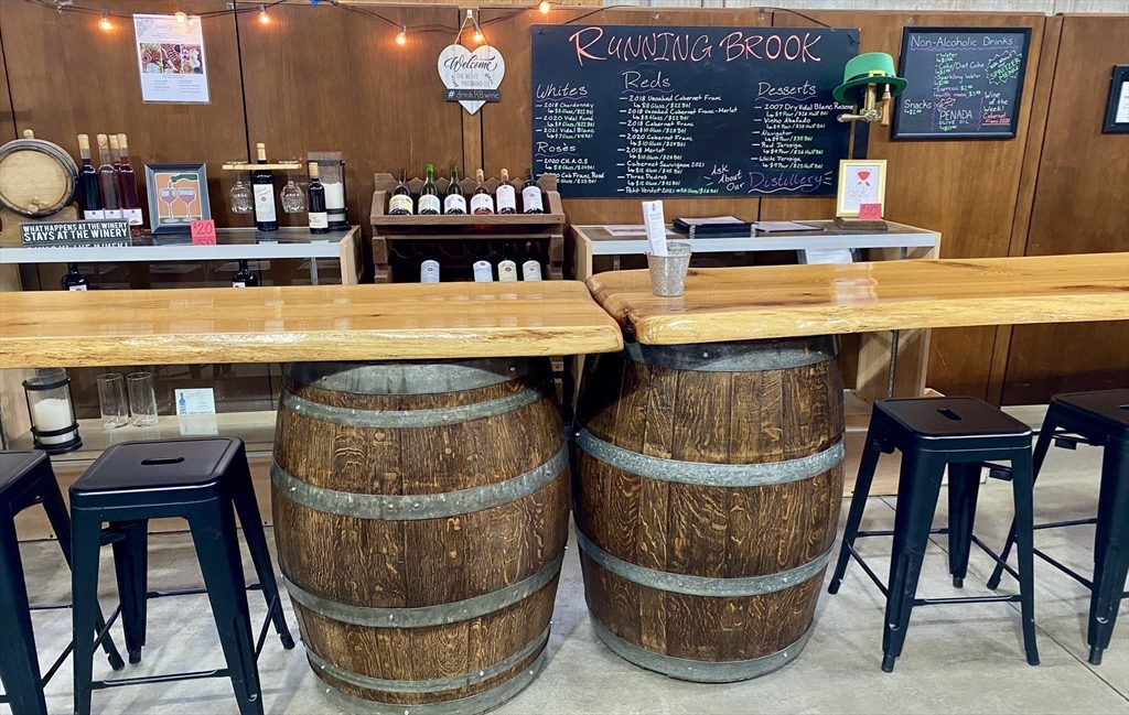 335 Old Fall River Road Dartmouth, MA 02747 - Photo 22 of 32 a view of dinning table and chairs in the patio