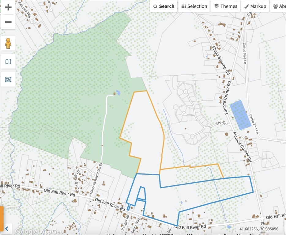 335 Old Fall River Road Dartmouth, MA 02747 - Photo 30 of 32 a bed with a small white comforter and pillows