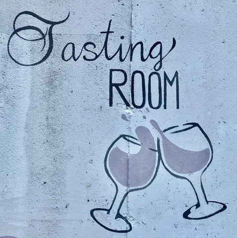 a view of dinning table and chairs in the street