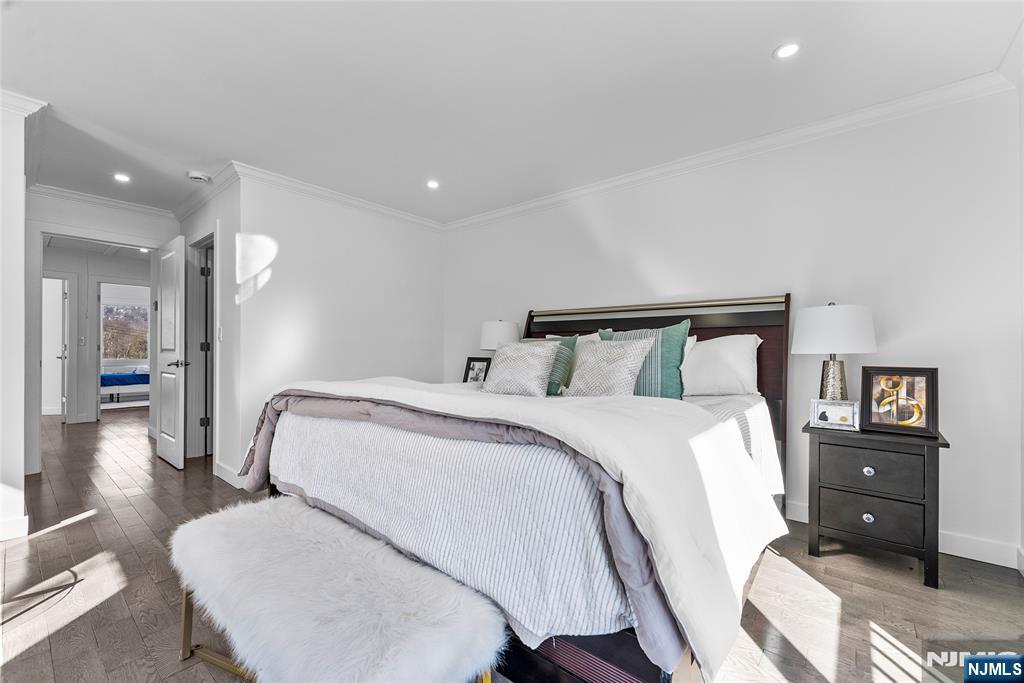 784 Valley Street Union, NJ 07088 - Photo 20 of 49 a bedroom with a bed and wooden floor