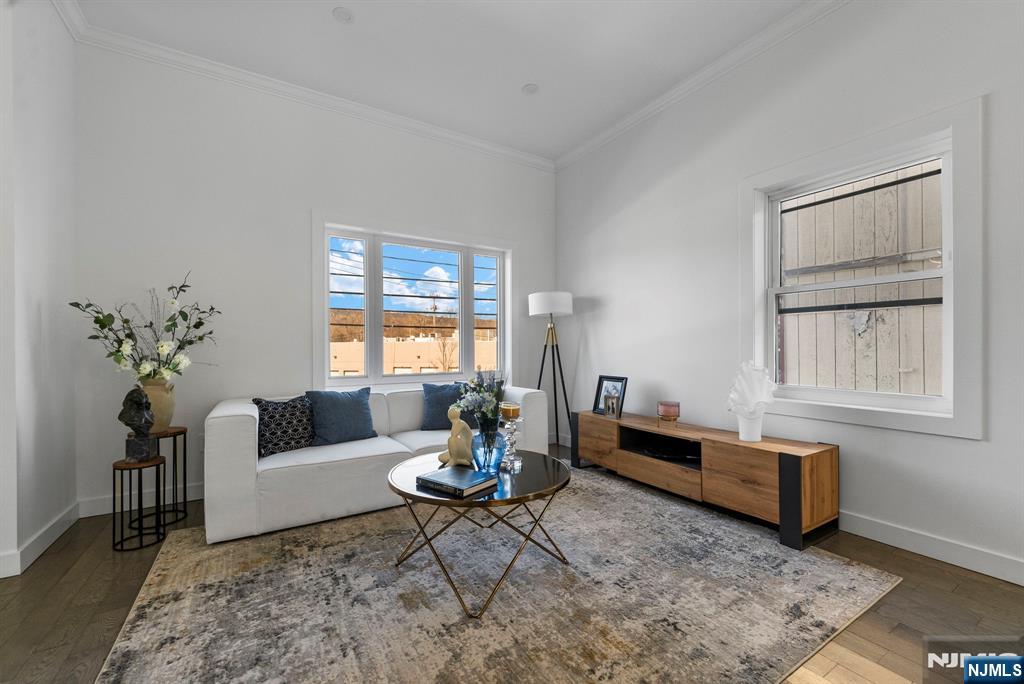 784 Valley Street Union, NJ 07088 - Photo 2 of 49 a living room with furniture and a window