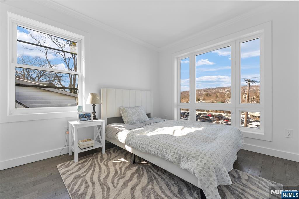 784 Valley Street Union, NJ 07088 - Photo 25 of 49 a bedroom with a bed and a window