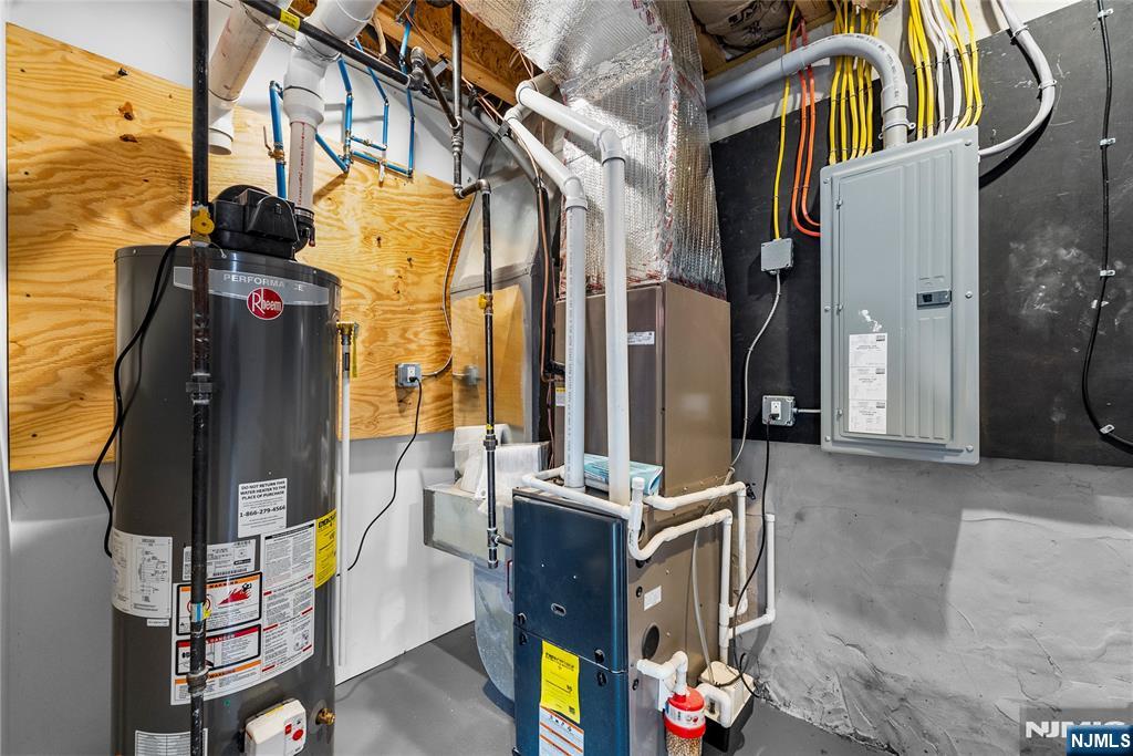 784 Valley Street Union, NJ 07088 - Photo 37 of 49 a view of walk in closet with clothes and shoes