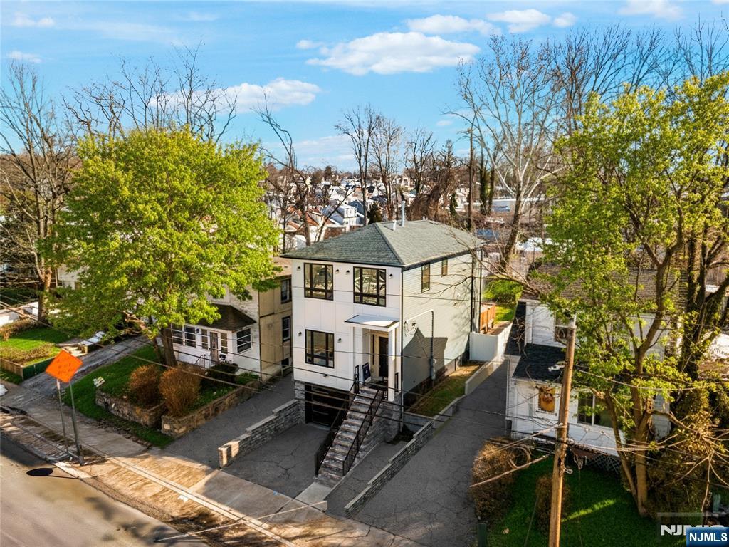 784 Valley Street Union, NJ 07088 - Photo 44 of 49 a view of a white house with a yard