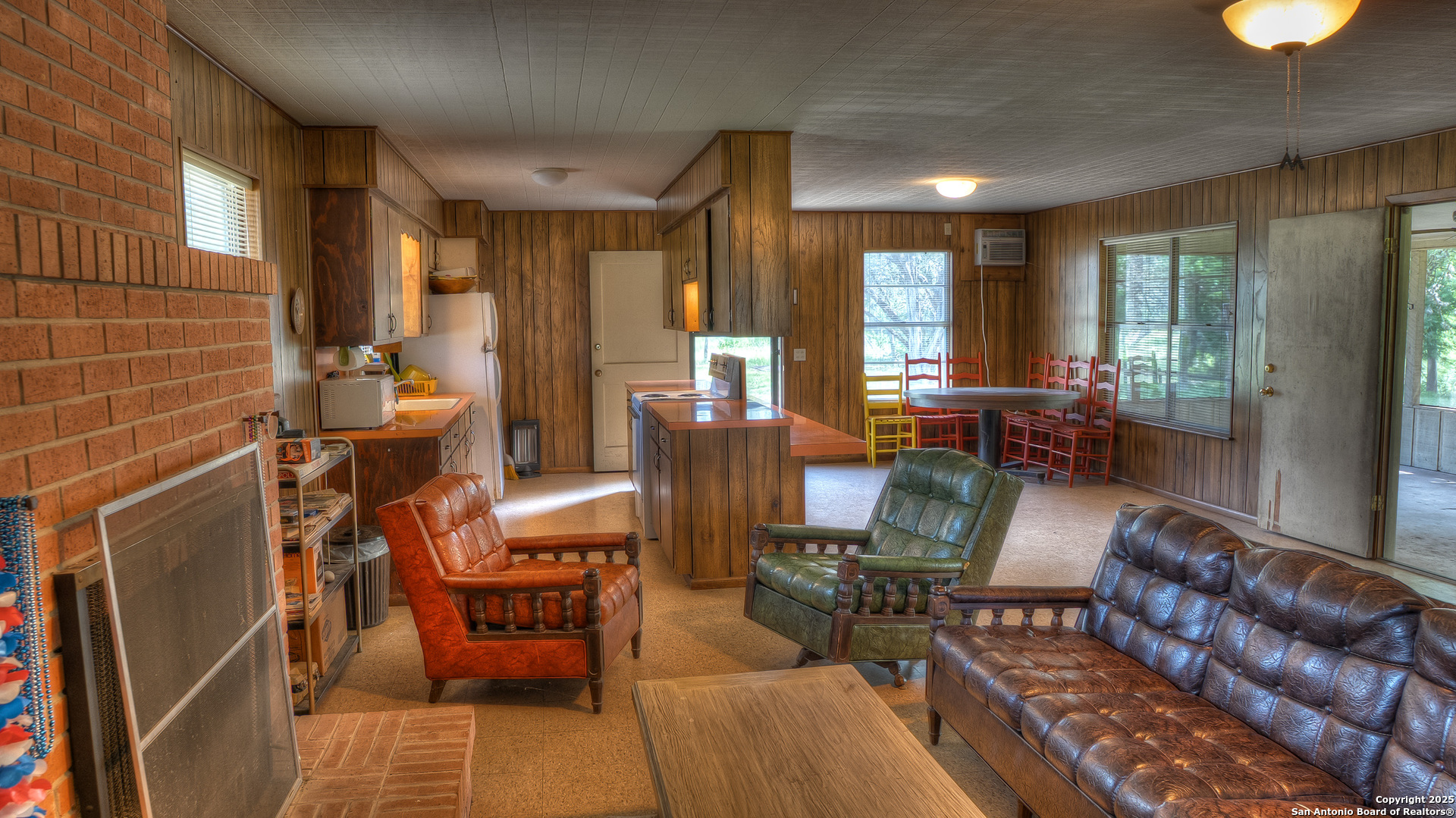 154 Weston Road Leakey, TX 78873 - Photo 25 of 39 a living room with furniture and large windows