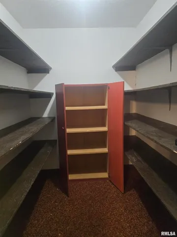 a view of storage and utility room