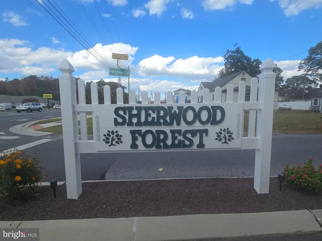 a view of a street with a building in the background