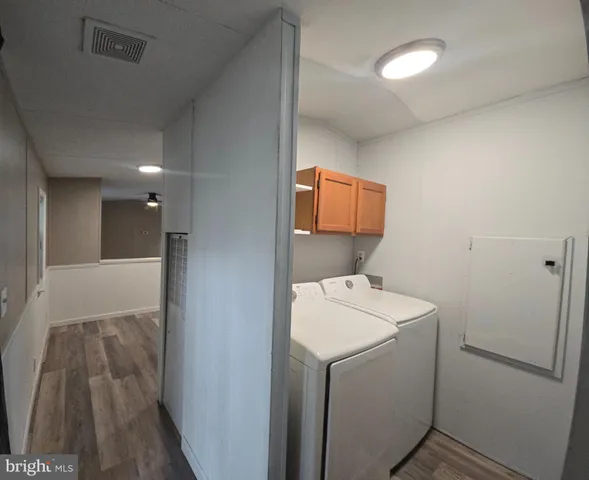 a bathroom with a sink toilet and vanity