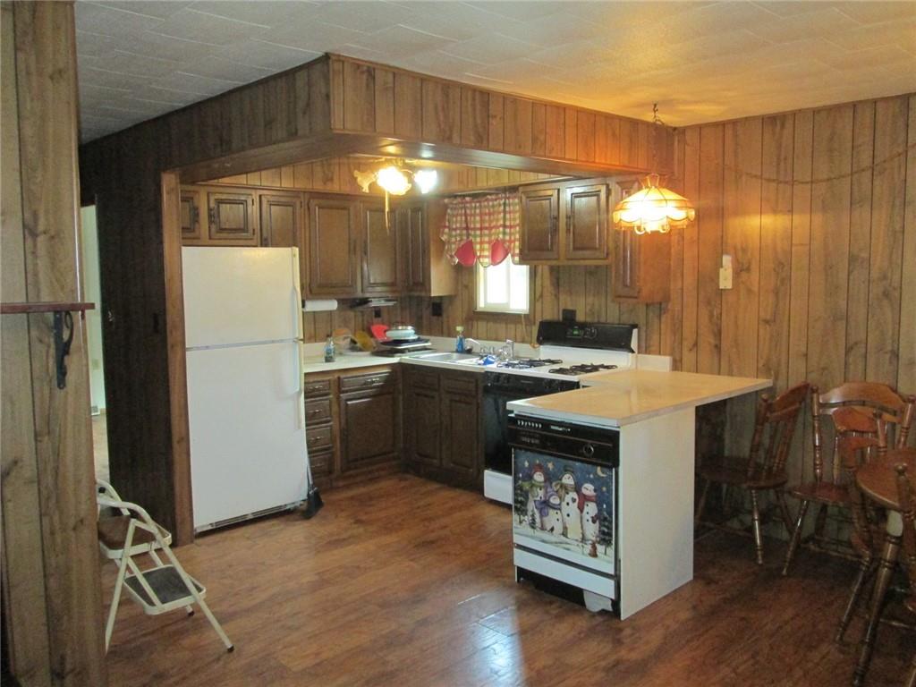 1075 Red Mill Road Kittanning, PA 16201 - Photo 6 of 18 a kitchen with a sink appliances and cabinets