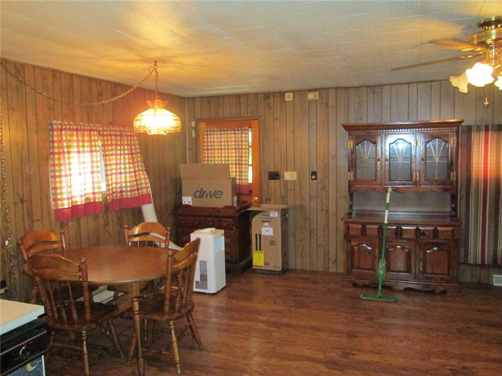 1075 Red Mill Road Kittanning, PA 16201 - Photo 8 of 18 a view of a a dining room with furniture window and wooden floor