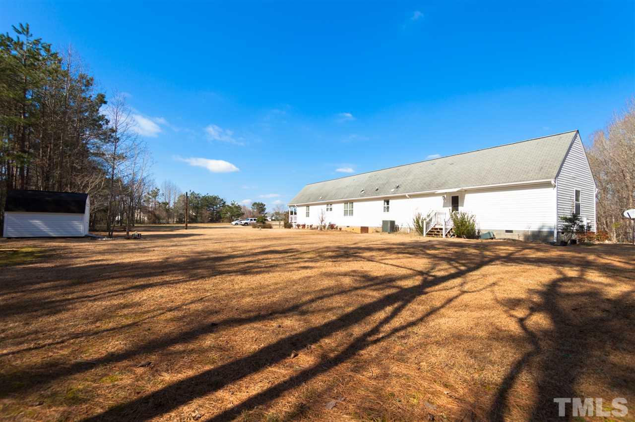 333 West Watson Road Benson, NC 27504 - Photo 24 of 25 a view of an ocean with a house
