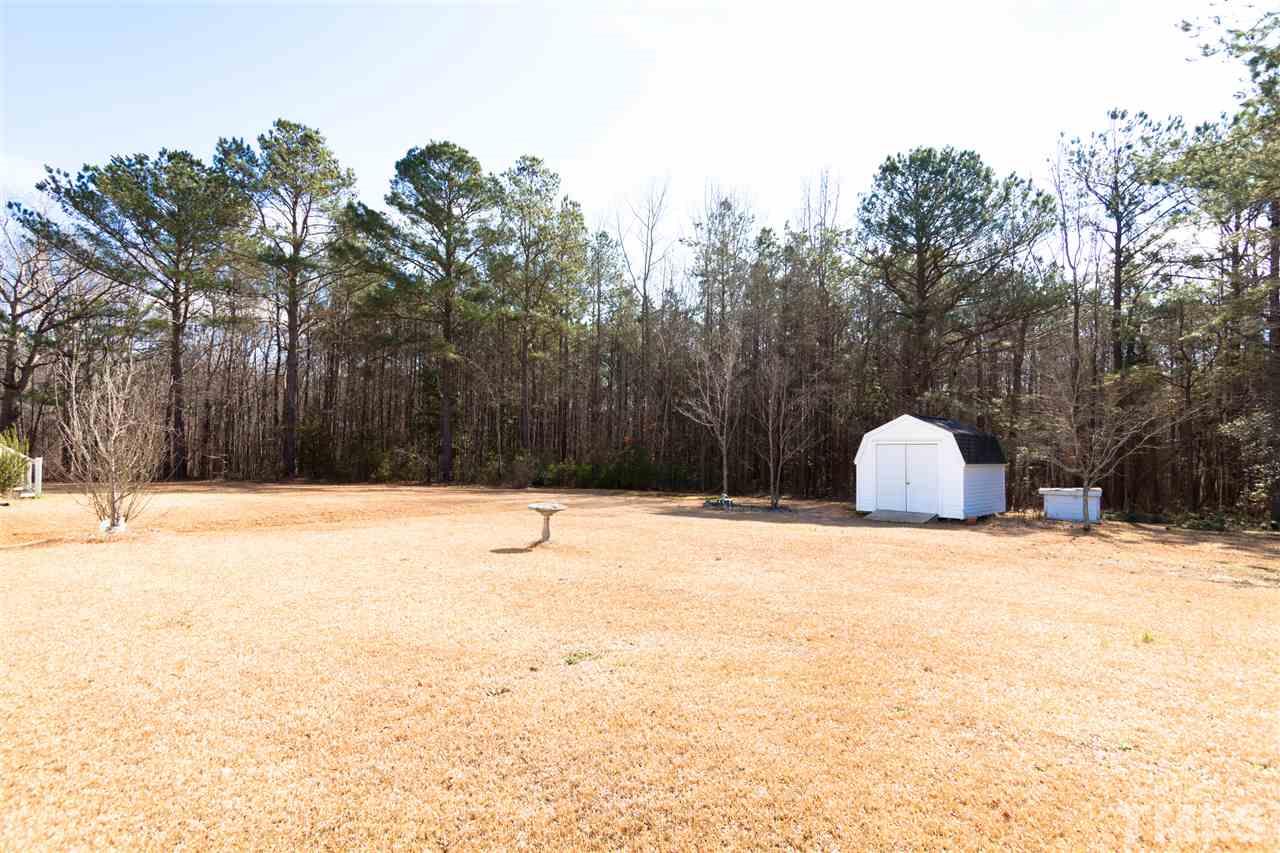 333 West Watson Road Benson, NC 27504 - Photo 25 of 25 a view of swimming pool and a yard