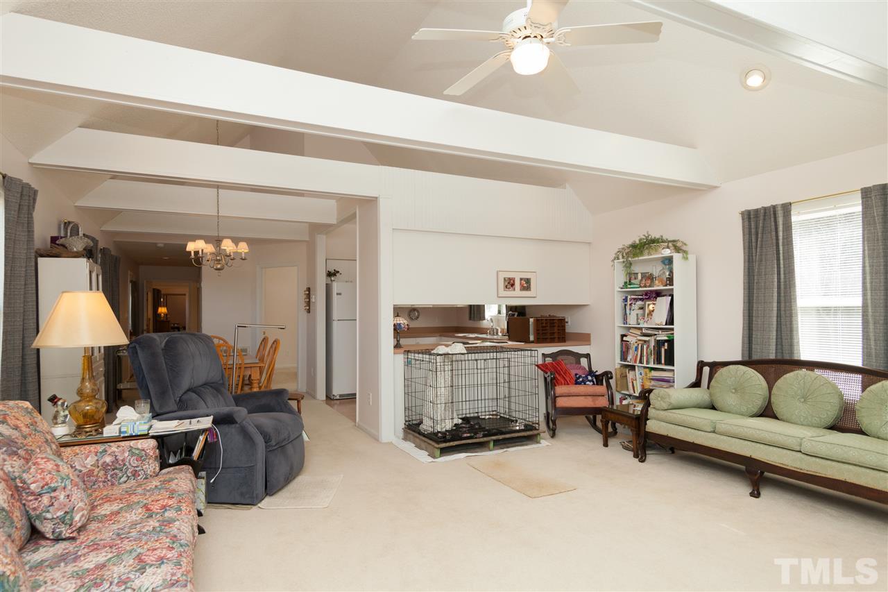 333 West Watson Road Benson, NC 27504 - Photo 6 of 25 a living room with furniture and a flat screen tv