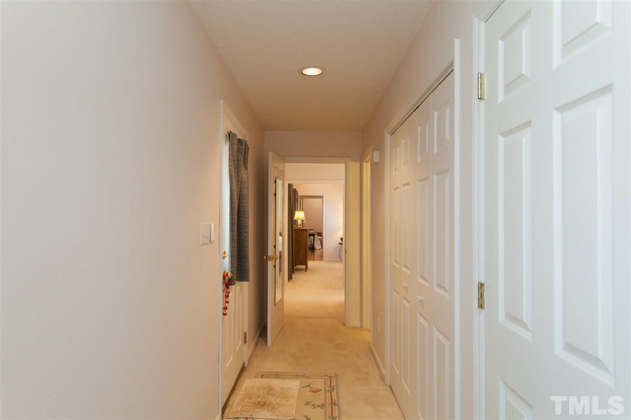 333 West Watson Road Benson, NC 27504 - Photo 10 of 25 a view of a hallway with wooden shelves