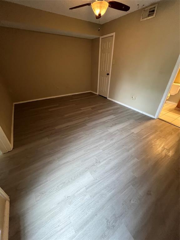 9811 Walnut Street, Unit 201 Dallas, TX 75243 - Photo 4 of 9 an empty room with a empty space