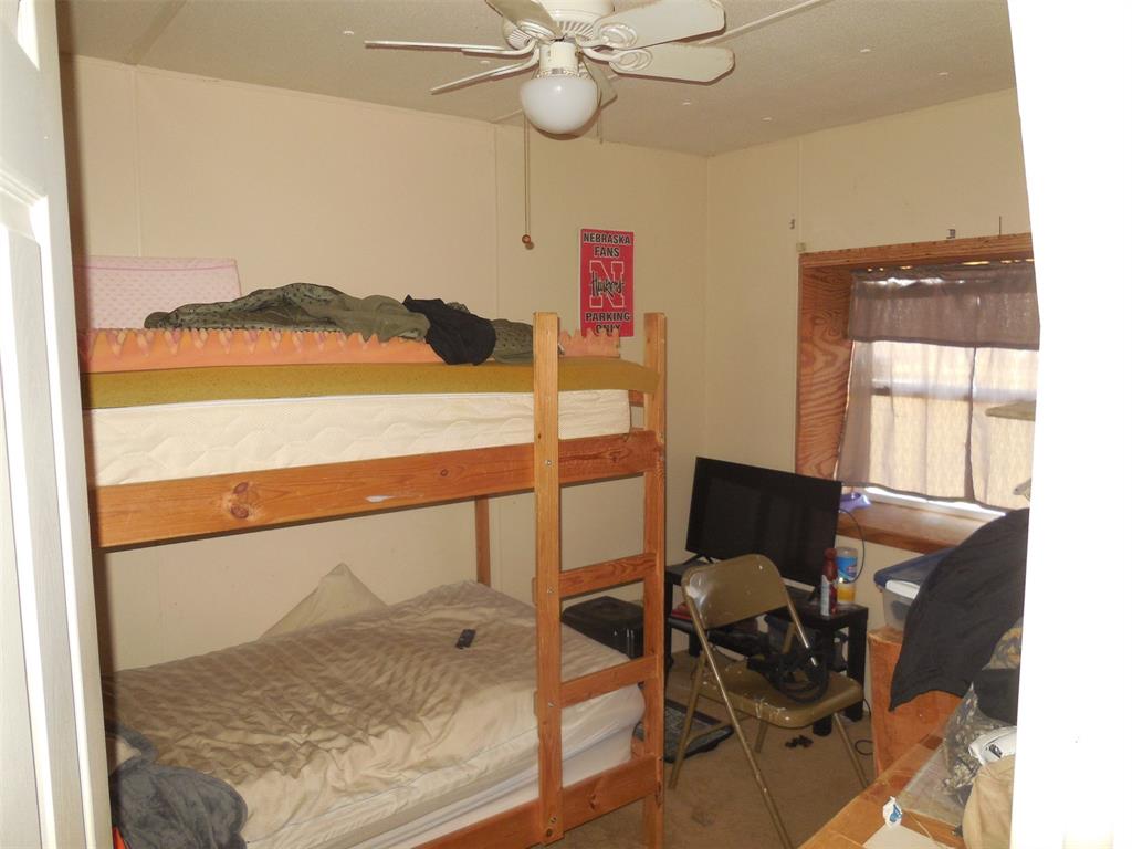 12436 County Road 134 Ranger, TX 76470 - Photo 17 of 32 a view of a livingroom with furniture and window