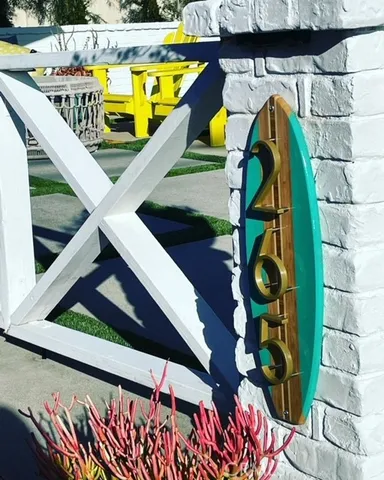 a view of swimming pool with sitting area