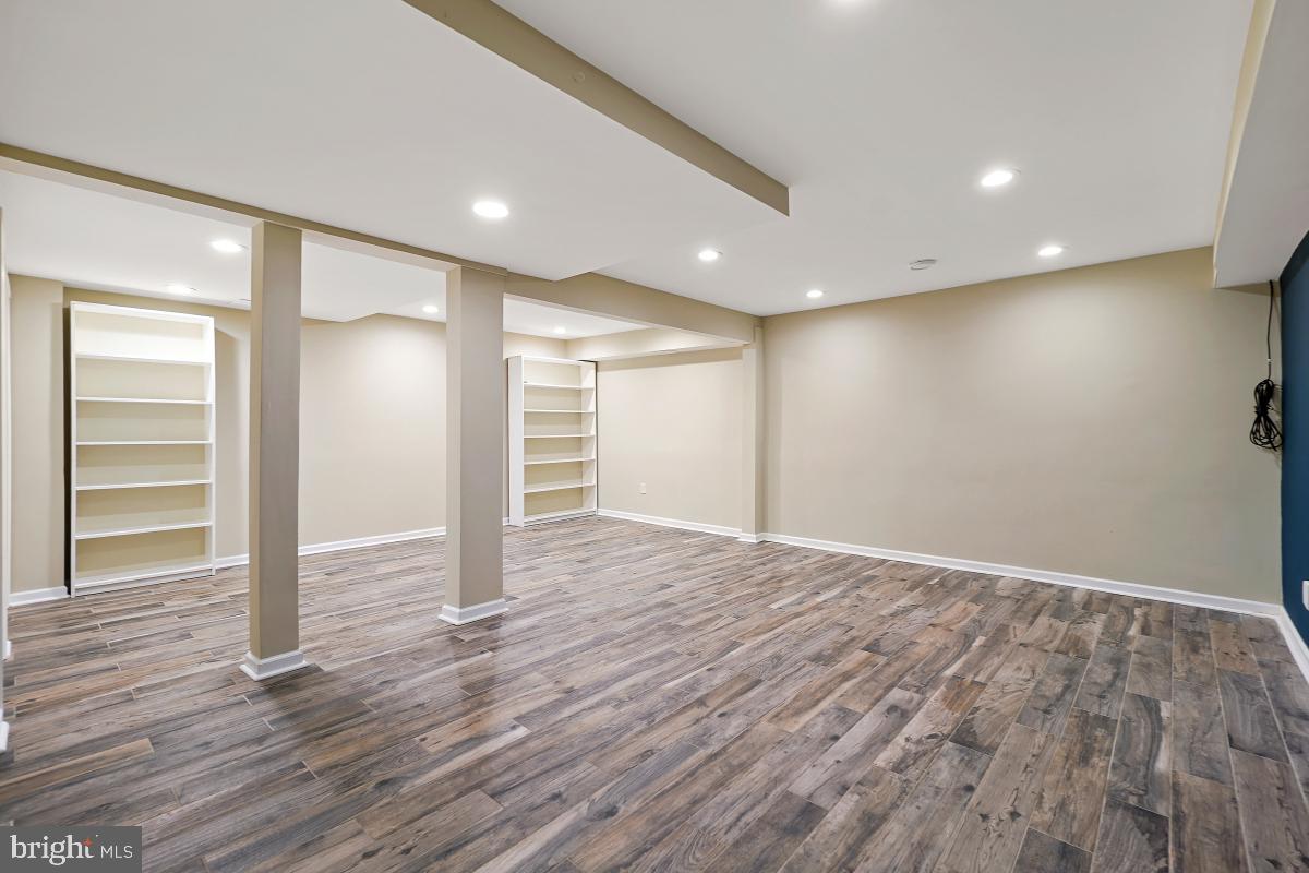 10867 Bucknell Drive, Unit 52 Silver Spring, MD 20902 - Photo 28 of 33 a view of empty room with wooden floor
