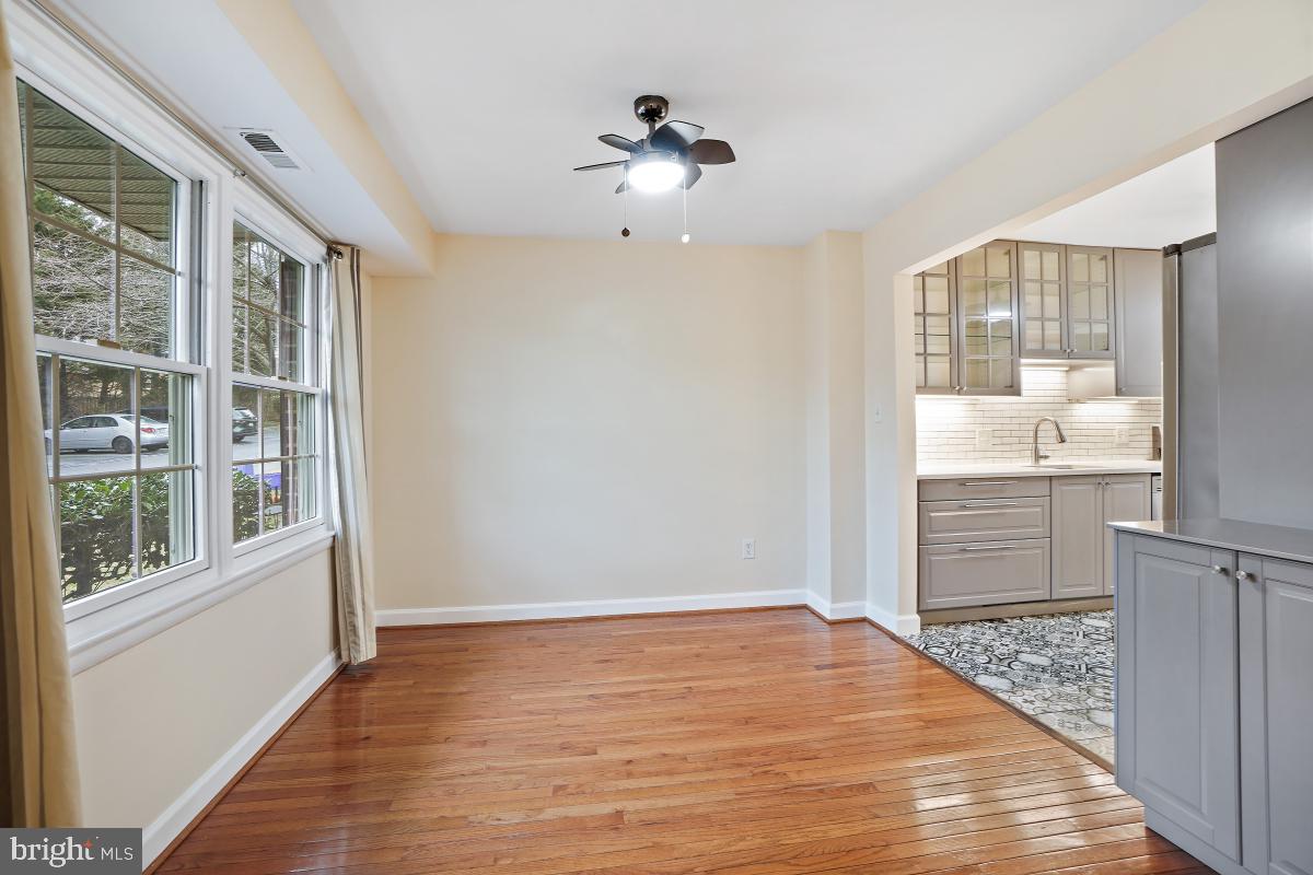 10867 Bucknell Drive, Unit 52 Silver Spring, MD 20902 - Photo 5 of 33 a view of an empty room with a window