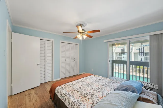 a view of a balcony with wooden floor