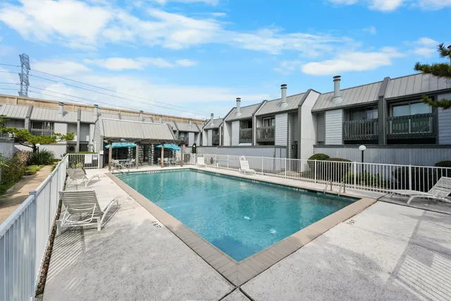 a view of a house with a swimming pool