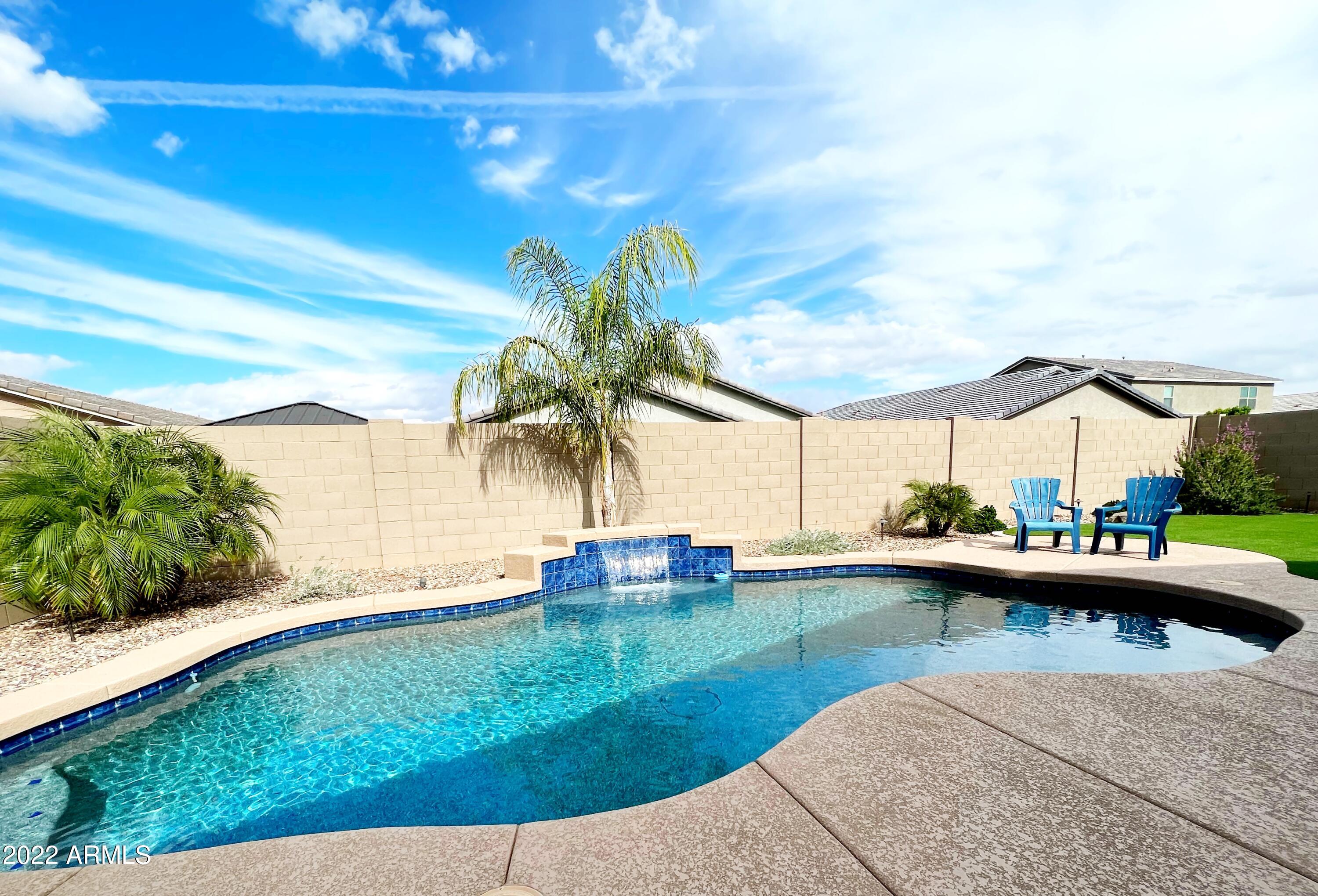 3330 West Fremont Rd. Phoenix, AZ 85041 - Photo 31 of 43 a view of swimming pool yard from a patio