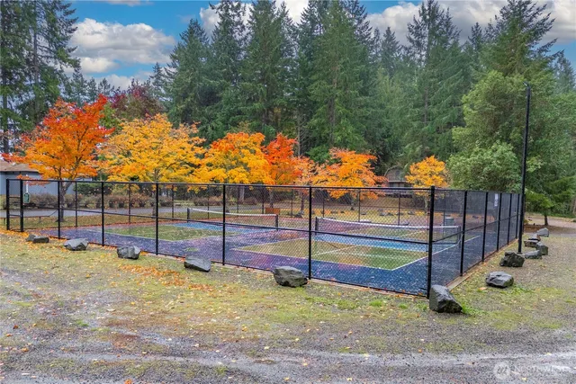 a view of outdoor space and tennis court