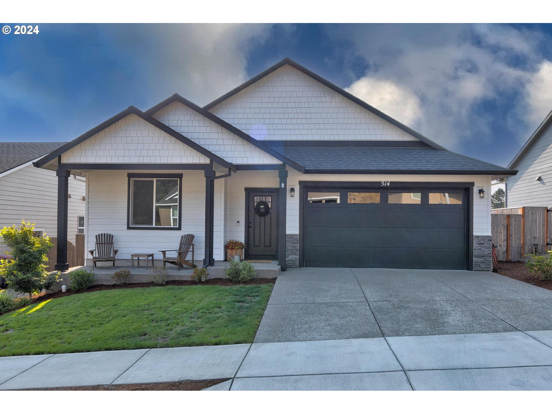 514 Merlot Street Amity, OR 97101 - Photo 1 of 33 a front view of a house with a yard and garage