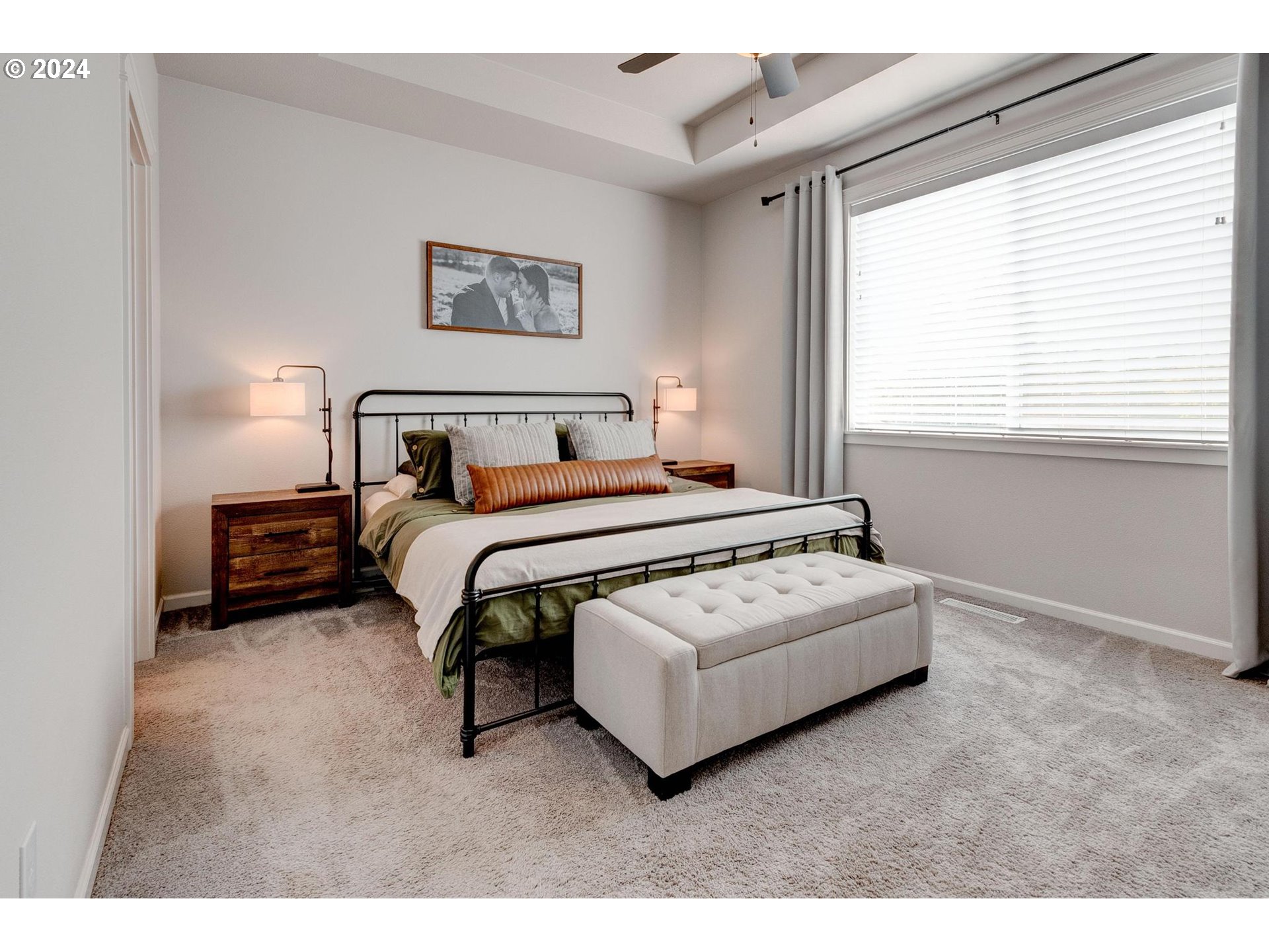 514 Merlot Street Amity, OR 97101 - Photo 15 of 33 a bedroom with a bed lamp and a large window