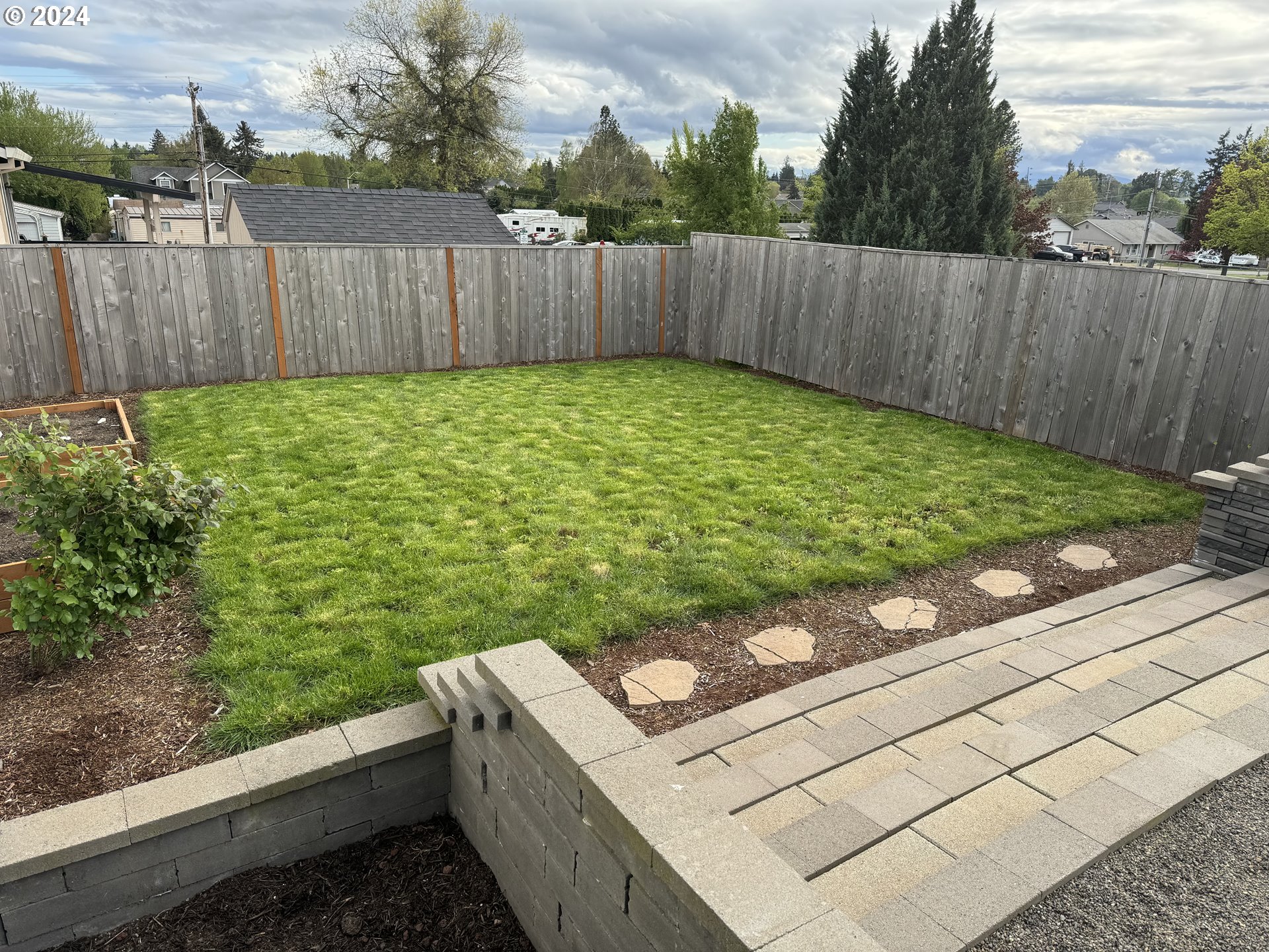 514 Merlot Street Amity, OR 97101 - Photo 29 of 33 a view of a backyard with wooden fence