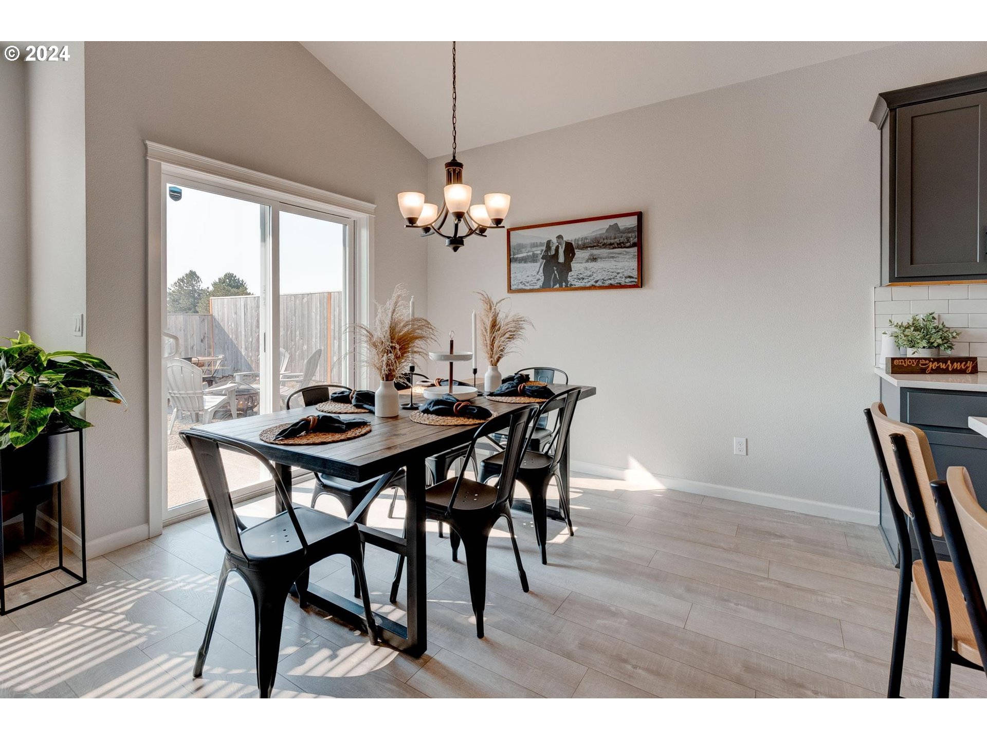 514 Merlot Street Amity, OR 97101 - Photo 10 of 33 a view of a dining room with furniture window and wooden floor